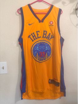 Nike Golden State Warriors Kevin Durant jersey in orange with blue and purple accents