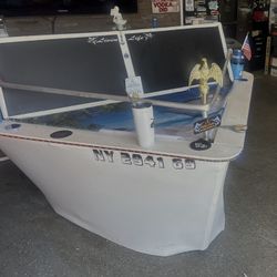 This is a custom Rolling boat bar that was designed to be easily Movable and will fit through a standard door height . One person setup on  wheels. Al