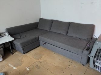 Ikea Friheten pullout couch with storage.