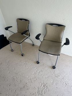 2 Rolling Chairs 
