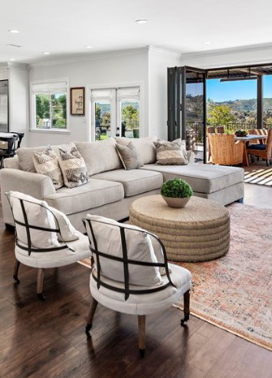 Beautiful Sectional Couch With Magnolia Home Pillows And Restoration Hardware Chairs