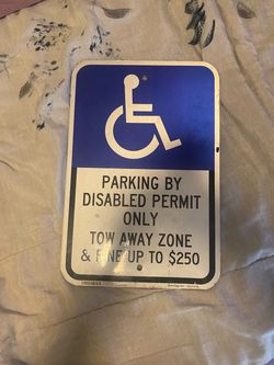 Real tow sign