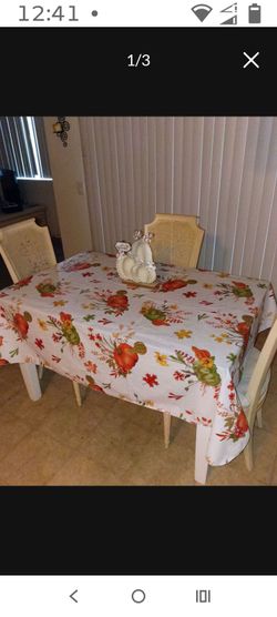 Solid wood farmhouse style kitchen table gray and white with three cream colored chairs excellent use condition sturdy strong beautiful