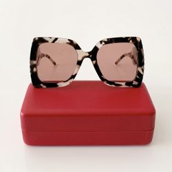 Authentic Carolina Herrera Oversized square-frame sunglasses, crafted from glossy acetate with a maxi monogram on wide arms. Pearl detailing on sides 