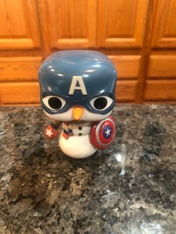 Funko Pop Captain America Cap Snowman # 532. Preowned Good condition. No box. Had been on display in a cabinet with a Funko Pop Collection. Smoke