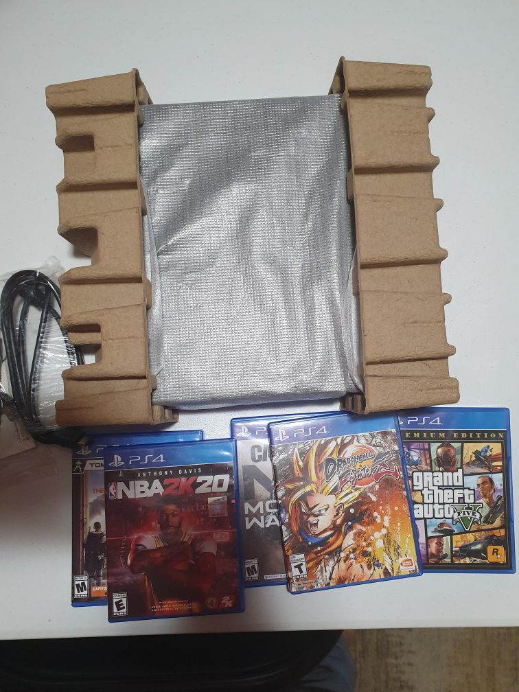 Brand New Playstation Pro + 5 Games