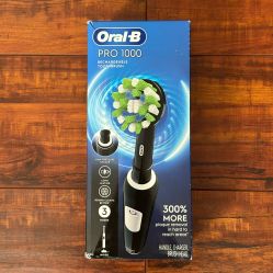 Oral B PRO 1000 Rechargeable Toothbrush; Plaque Removal In Hard Reach Areas: 1 Handle, Charger And Brush Head 
