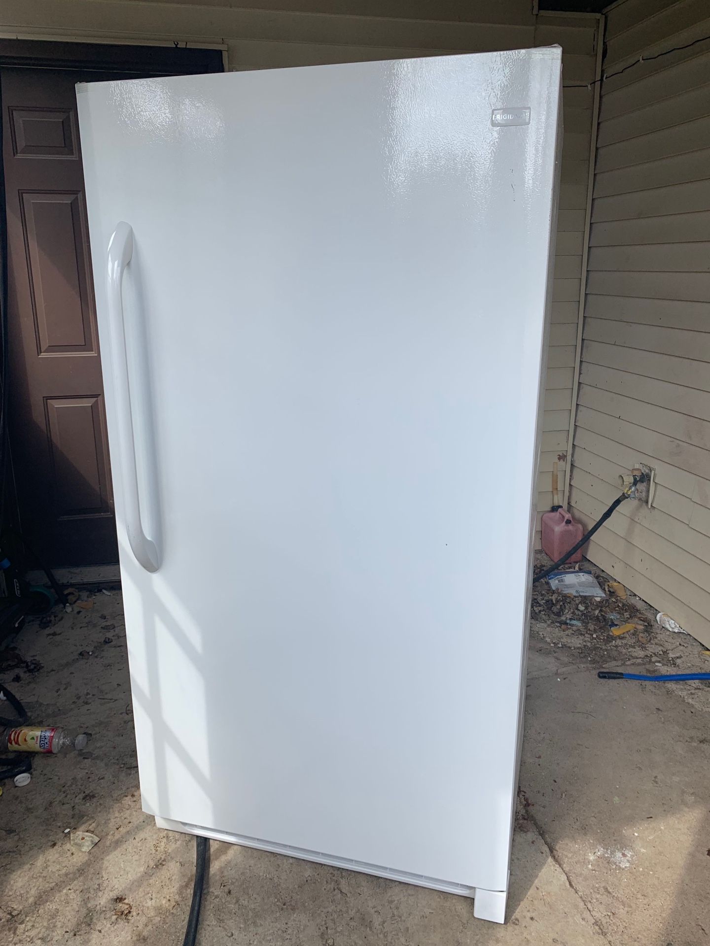 Frigidaire up right deep freezer new $300 or best offer