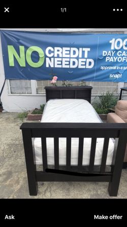 Twin bed with mattresses
