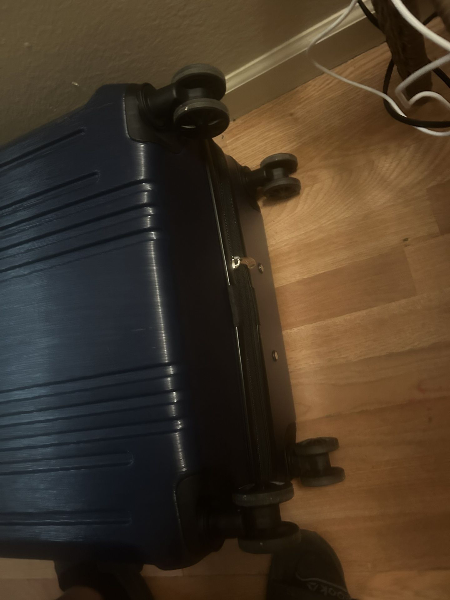 Large suitcase, navy blue with lock and wheel wheels