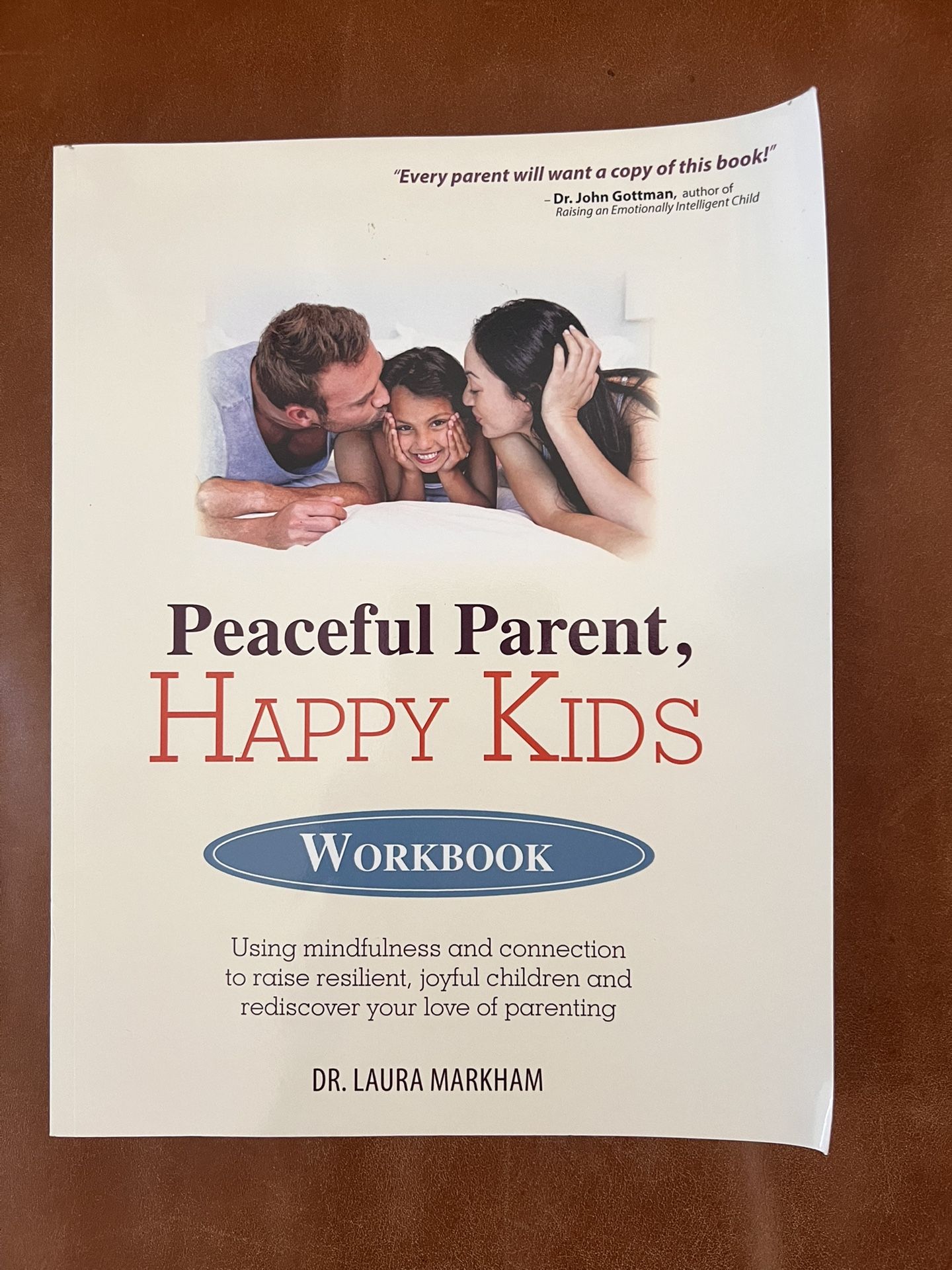 "Peaceful Parent, Happy Kids Workbook" by Dr. Laura Markham, New