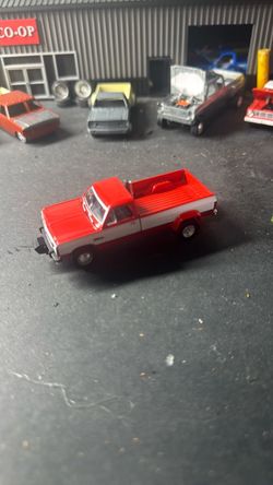 Red and White Diecast Pickup Truck Model