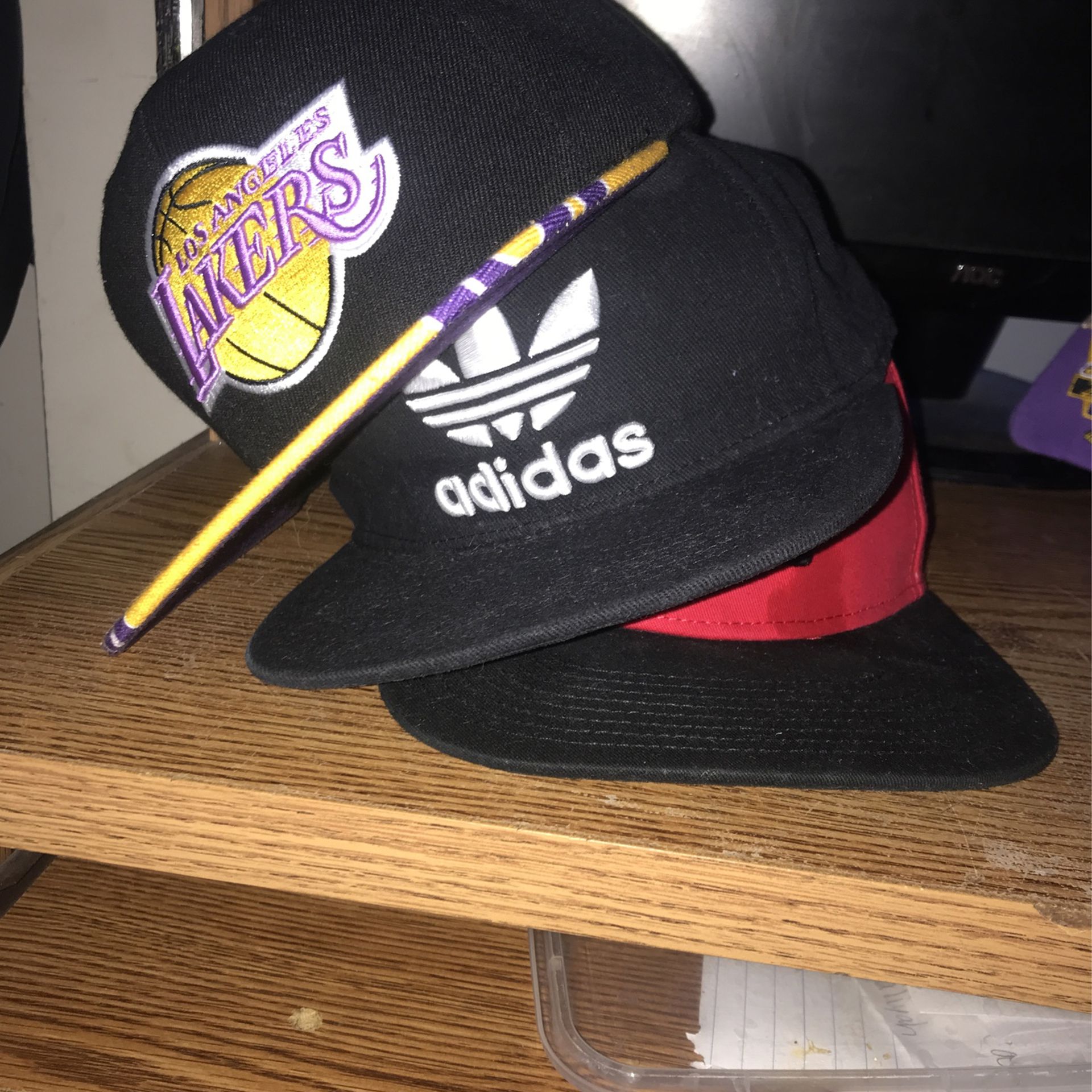3 Hats, A Michell And Ness Lakers Hat, A Adidas Hat And A NEFF Hat