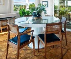 White round dining table with glass topper