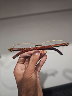 Cartier rimless wood temple glasses
