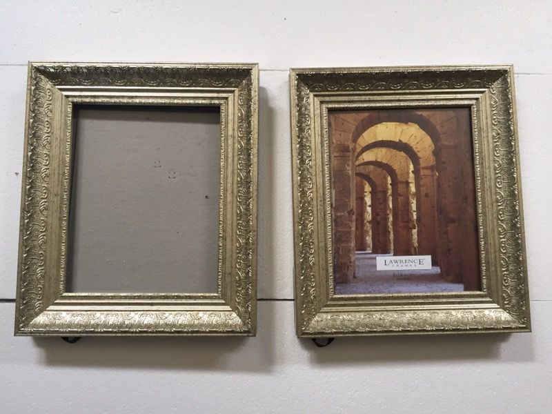 2 matching gold picture frames