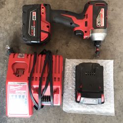 Milwaukee M18 Drill Charger And Batteries 