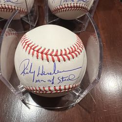 Rickey Henderson Autographed OML Baseball w/Man of Steal-Beckett Witness Holo