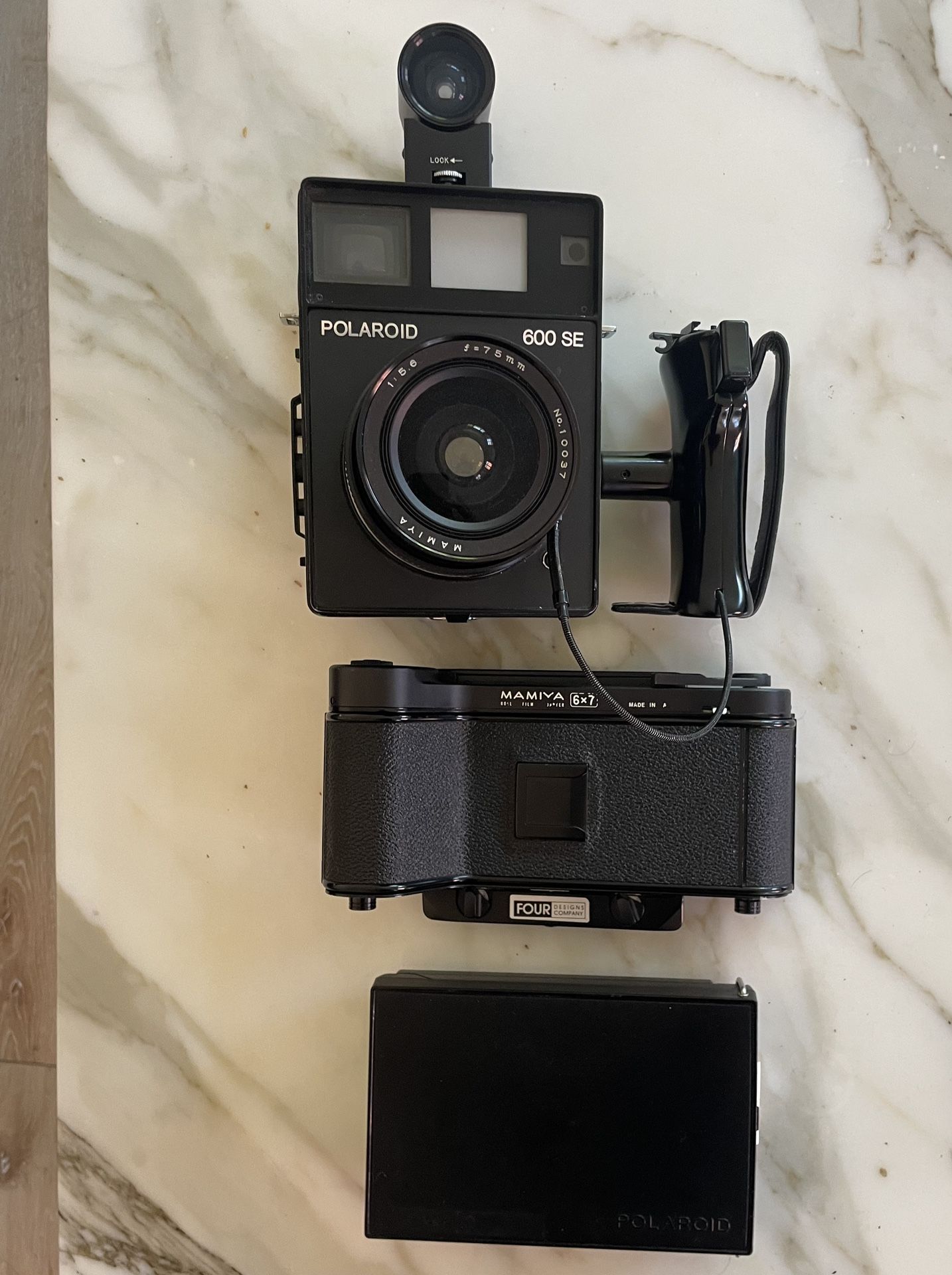 Polaroid 600se medium format w/ 75mm lens Polaroid back and 6x7