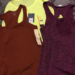 Three brand new size medium women’s shirts with the tags still attached all three for $20