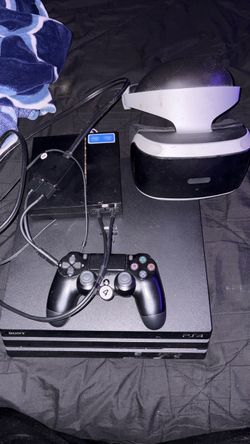 PS4 with controller and PS4 VR