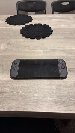 Nintendo Switch with Joy-Con Controllers