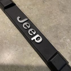 JEEP LICENSE PLATE FRAME (NEVER USED)