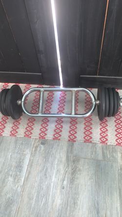 Weight Plates and Tricep Hammer Curl Bar