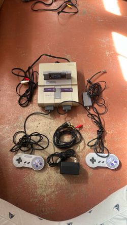 Super Nintendo Entertainment System w/ Controllers and Game Cartridge
