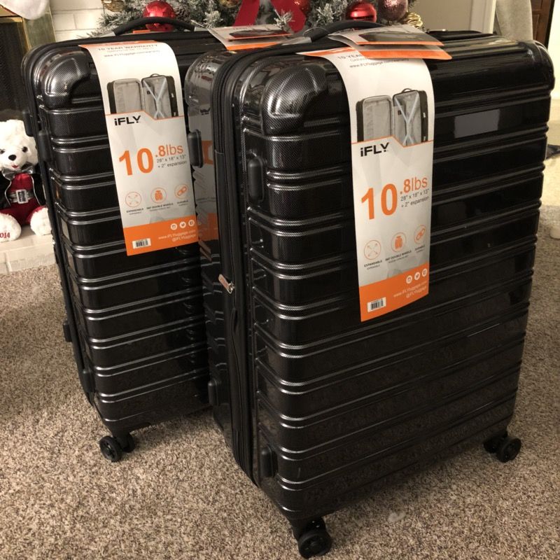 iFLY HARD SIDED LUGGAGE FIBERTECH 28", BLACK Lightweight: 10.8 lbs/ 4.9 kg (28) 4 double spinner wheels makes 360 navigation effortless Strong ABS/PC