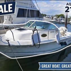 FOR SALE: 1998 Aquasport 215 Explorer – Ready for the Season! Looking for a reliable, offshore-capable walkaround that handles the chop with ease? Thi