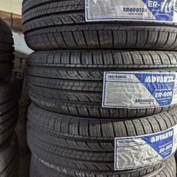 BRAND NEW SET (4) 185 65 14 ALL SEASON TIRES !!!
