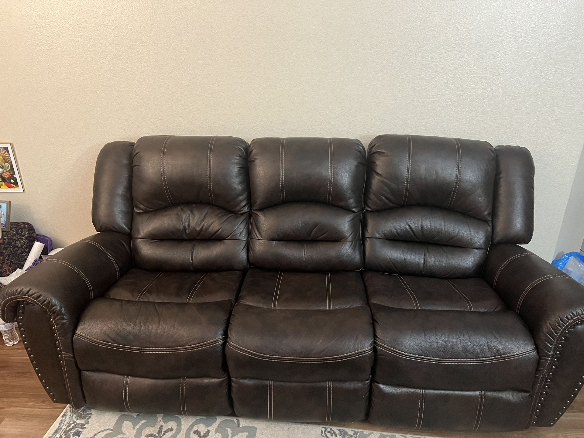 Leather Recliner (Manual) Sofa.