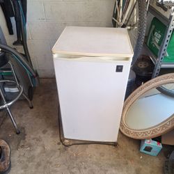 White mini fridge