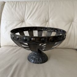 Heavy iron decorative fruit bowl. Solid, durable, and stylish—perfect as a centerpiece or accent piece for any interior. Adds a bold, elegant touch to