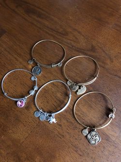 5 Alex and Ani bracelets