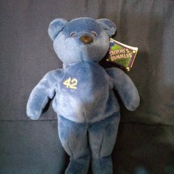 A 1999 Salvinos Bammers MLB Opening Day Plush Beanie Bear, Featuring New York Mets Player Mo Vaugn With The Number 42 Embroided On The Chest.