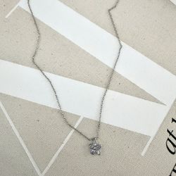 Kay Jeweler’s sterling silver dainty floral necklace