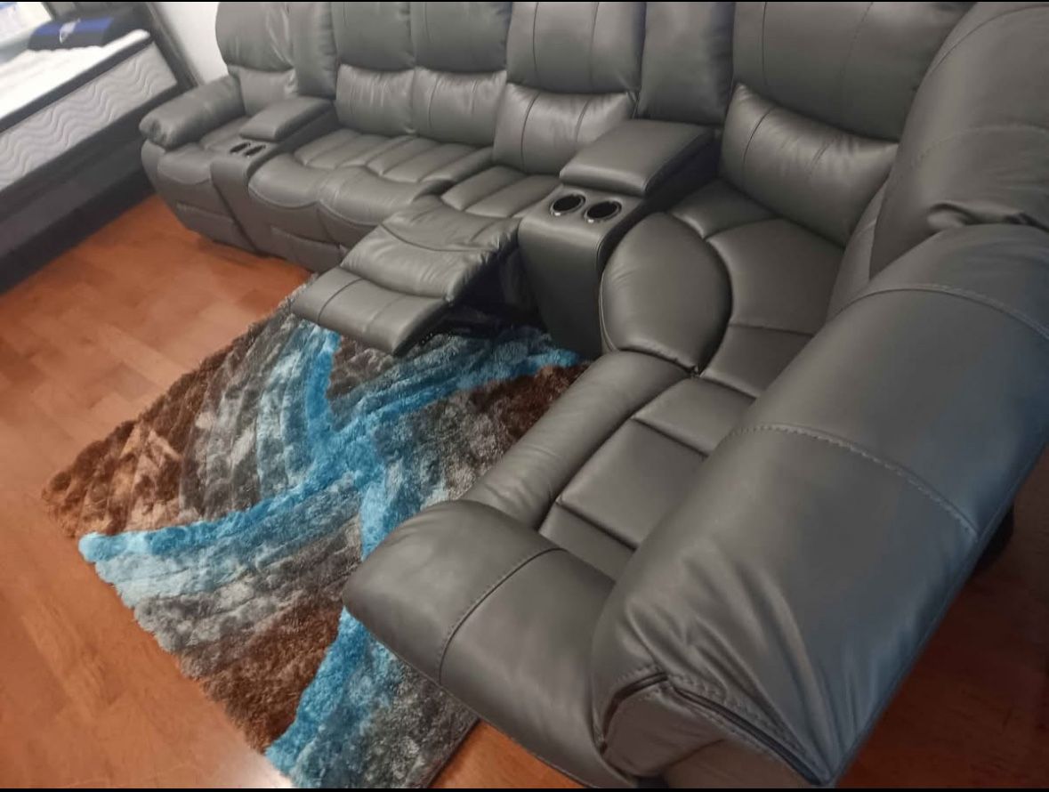 Going out of business sale. Madrid gray leather reclining sectional now $1599. Easy finance option. Same day delivery.