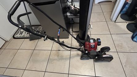 Craftsman 29cc 4-cycle gas walk-behind edger.