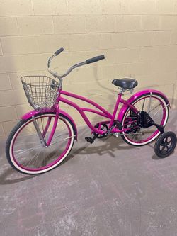 Pink beach cruiser bike