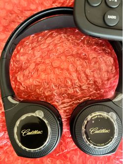 4 new GM  headphones Headset 2 CHANNEL REAR DVD SYSTM Premium CADILLAC with remote