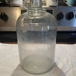 Vintage Gallon jug that says full gallon