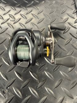 Shimano Curado BFS XG bait casting reel RH w/ power pro braid
