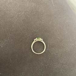 Women’s 10k Ring  Precious Stone & Two Diamonds.