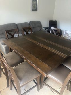 Dining room, wooden table with eight chairs