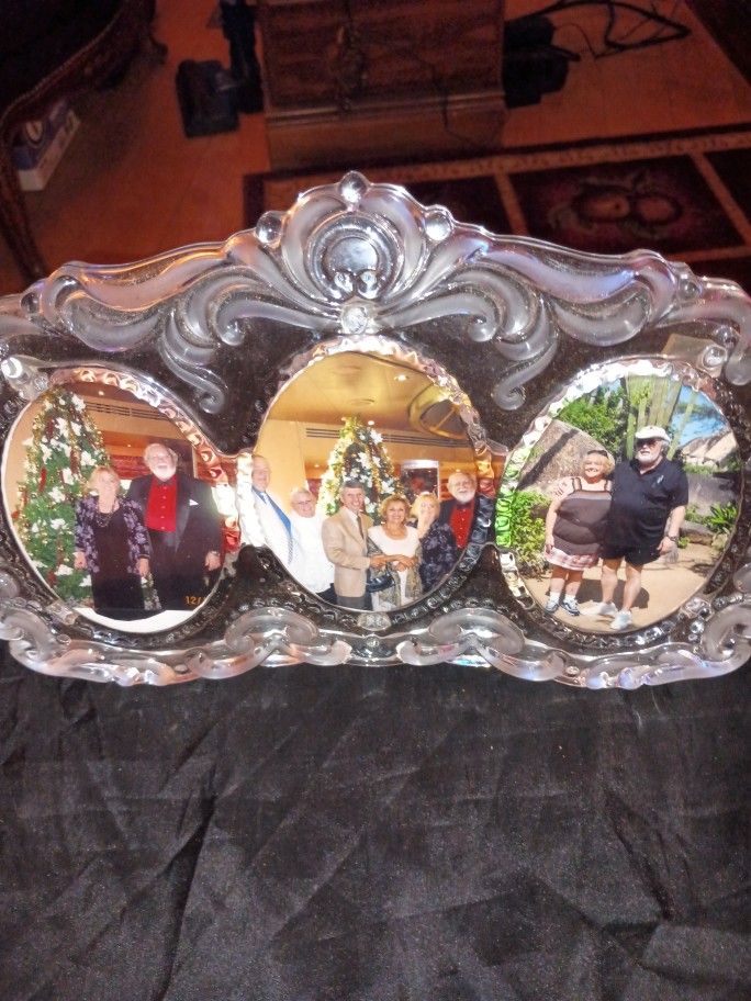 Beautiful Glass Frame Holds Three Pictures