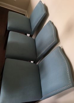 Three 24" counter height chairs