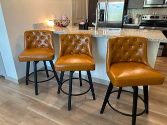 Three Matching Swivel Barstools