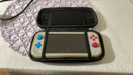 Nintendo switch with games and case